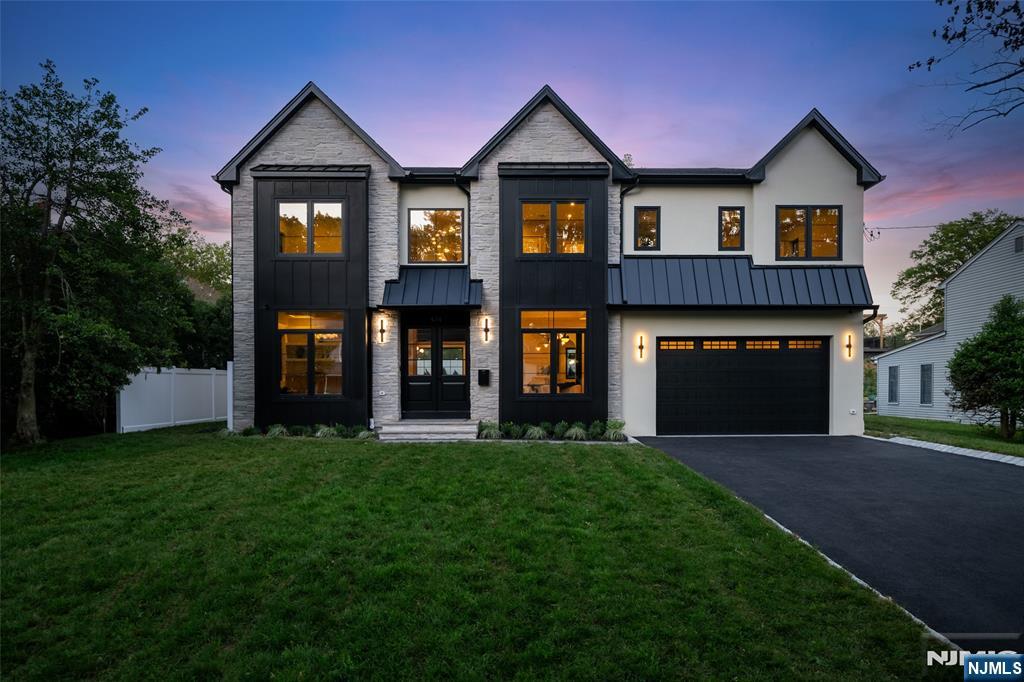 Absolutely stunning brand-new construction, new foundation masterpiece - built by Peak Developers in collaboration with JLA Interiors. Showcasing an exceptional level of craftsmanship, this residence is defined by its luxurious designer finishes, thoughtful architectural details, and uncompromising quality throughout. A striking first impression begins in the grand entrance foyer, highlighted by custom walnut millwork and dramatic designer elements that set the tone for the home. The main level offers an effortless flow for both everyday living and entertaining, featuring a spectacular chef's kitchen with premium finishes and appliances, elegant dining area, expansive great room, and a private home office. Throughout the home, artisan limewash finishes, carefully curated tile selections, and sophisticated design details create a warm yet luxurious atmosphere. The 2nd level offers 5 generously sized bedrooms and 4 full bathrooms, including a stunning primary suite, 2 junior suites with private baths, and 2 additional bedrooms serviced by a hallway bathroom. The fully finished lower level expands the living space with a large rec room, dedicated fitness room, private theater, 6th bedroom, and a full bathroom, creating the perfect setting for recreation, guests, and entertaining. Combining timeless design, exceptional craftsmanship, and high-end finishes rarely seen in today's market, this remarkable new construction offers luxury living at its finest.