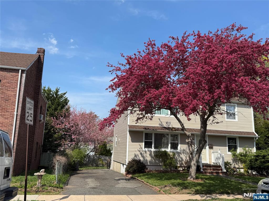 Large, sunny and bright two bedroom apt on the 1st floor in a residential area, long driveway on the left provides off street parking for 3 cars. Large LR, MEIK, two good sized bedrooms and a full bath on the first floor. The ground level has a separate entrance, full bath, family room, full bath, office and laundry. Both full baths have jacuzzis. Exclusive use of large backyard. Located on the Tenafly border and an easy commute to NYC buses 5 blocks away and NYC train nearby.