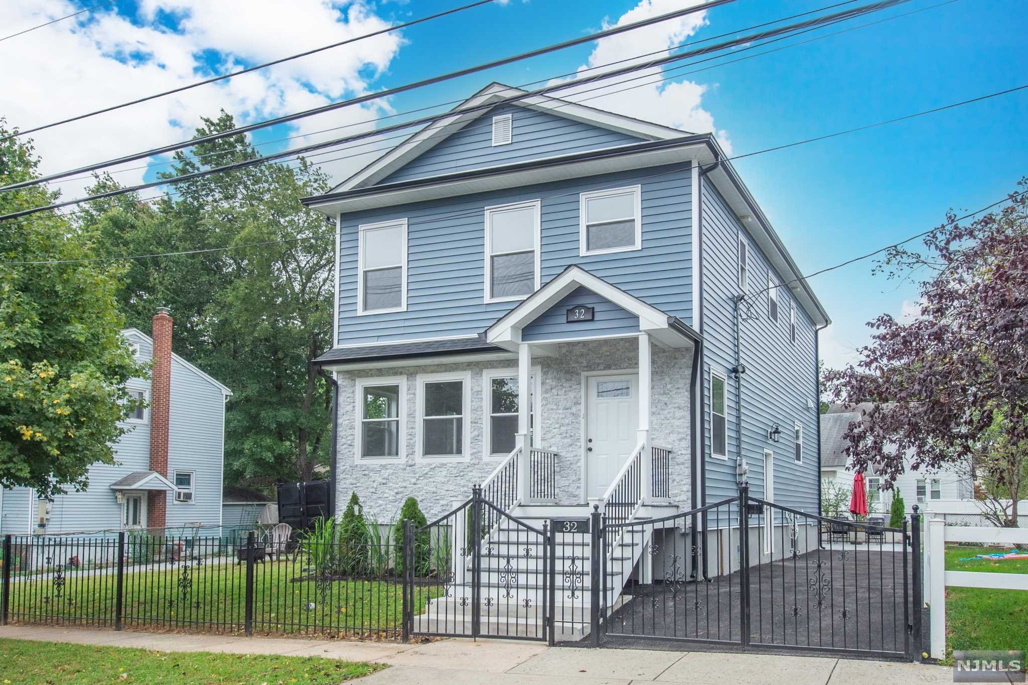 No Expense has been spared on this stunning fully renovated side hall colonial on a quiet tree lined street. Kitchen features new SS appliances, granite counters and breakfast bar that opens onto a bright dining and living room with gleaming new oak hardwood floors, and a full bath. Primary bedroom suite with 3 additional bedrooms and 1 additional bath completes the 2nd fl. Finished basement provides multiple rooms of flexible space, perfect for exercise, den or office. Laundry room and full bath finish the interior. Step outside to a new deck and slate patio and spacious yard that is perfect for entertaining, Close to schools, parks, restaurants and transportation. Must see!