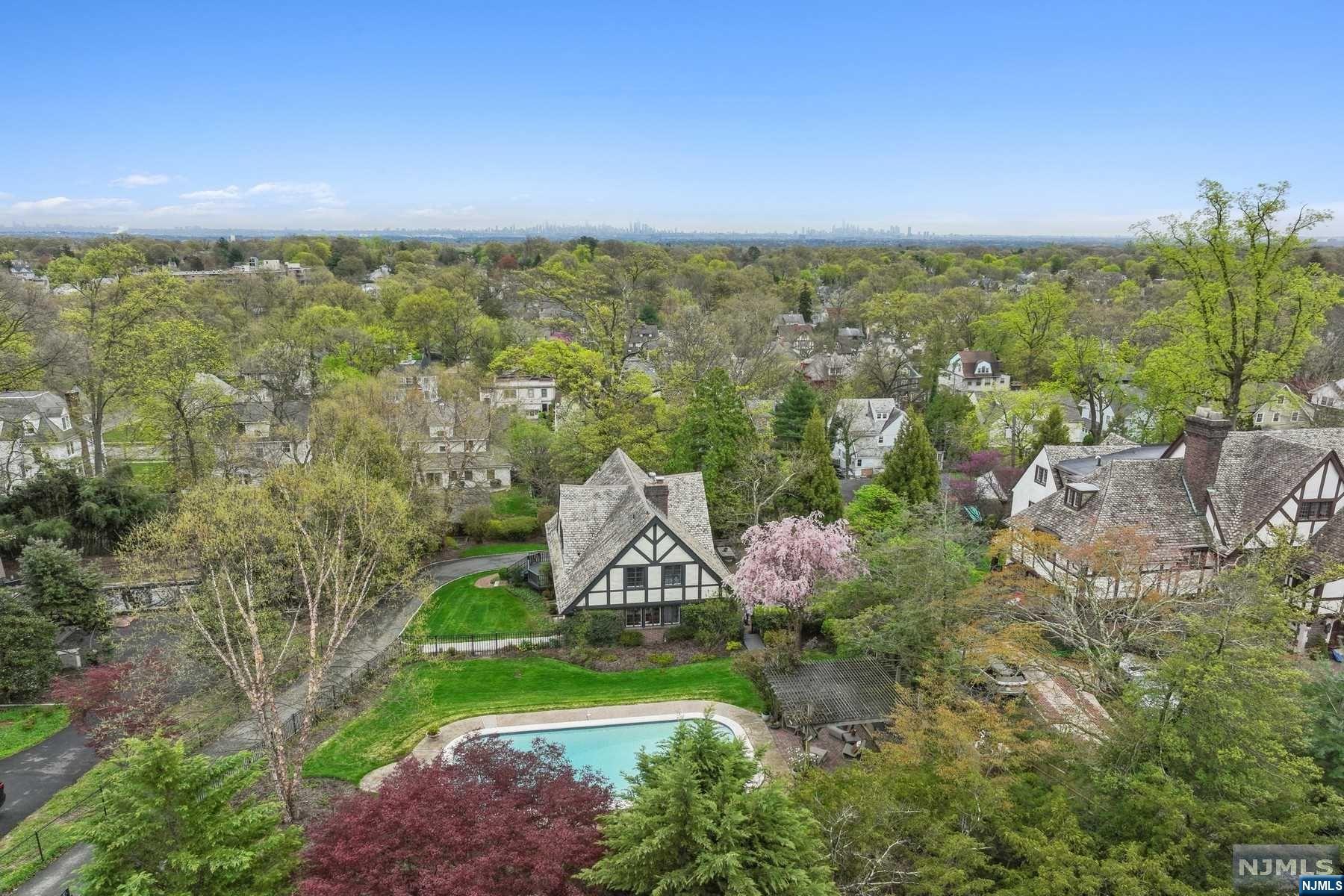 Wait until you see this timeless gem! Unique, spacious, and restored, this 3 Bedroom, 2-1/2 Bath CARRIAGE HOUSE combines an extraordinary piece of history reincarnated into the epitome of modern comfort & luxury. From the moment you cross the threshold, you'll be transported to a realm where the echoes of 1928 Cadillacs & the scent of polished wood blend harmoniously with the rhythms of modern life. Step outside into your private courtyard where lush greenery & fragrant blooms provide a picturesque backdrop for al fresco dining & leisurely evenings spent under the stars. Extra-large garage beneath with home entrance. Whether you're tending to your garden or simply basking in the sunshine next to your swimming pool, you'll love this Destination Home just blocks from Uptown Montclair shops, restaurants, parks and commuter train & 13 miles from NYC.