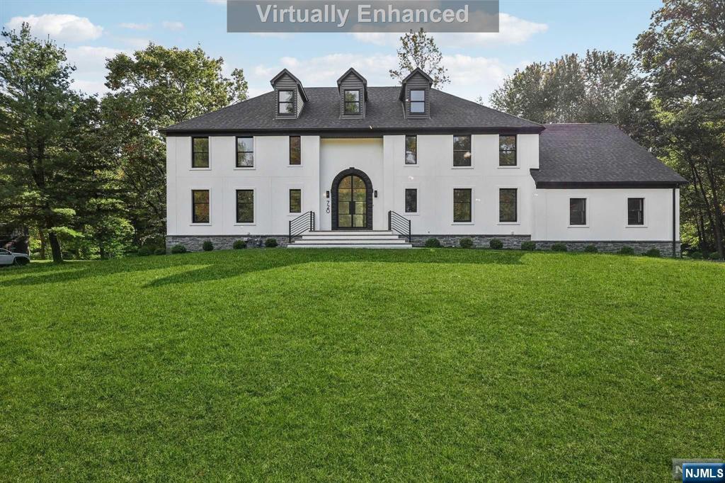 This newly renovated home offers breathtaking views of Kings Pond and is nestled in one of the town's most coveted neighborhoods. Perfectly blending traditional designs with modern touches, this home features four bedrooms and welcomes you with a grand two-story entrance foyer. The finished basement, with its soaring high ceilings, opens directly to the backyard, creating an ideal space for entertaining. The basement is a blank canvas, with endless possibilities. Upstairs, you'll find a luxurious primary suite, three additional bedrooms, two full baths, and a generously sized bonus room at the end of the hall. This home effortlessly combines elegance, comfort, and functionality, making it an irresistible choice for your next move.