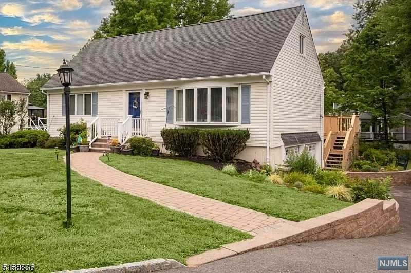 SUPER EXPANDED CAPE OFFERS 4 BEDROOM, 2 1/2 BATHS, BEAUTIFUL 6-YEAR-OLD EAT IN KITCHEN W/ BREAKFAST BAR, GRANITE TOPS, & STAINLESS-STEEL APPLIANCES. DR LEADING TO OVERSIZED DECK, HARDWOOD FLOORS THROUGHOUT THE HOUSE. UPDATED 2 1/2 BATHS, FINISHED BASEMENT WITH GAS FIREPLACE, LAUNDRY LEADING TO 2 CAR GARAGE, LARGE PRIVATE LOT. THERE IS A LARGE BEDROOM ON THE 1ST FLOOR WHICH COULD ALSO BE A MASTER BEDROOM ALONG WITH 2ND MASTER BEDROOM ON THE 2ND FLOOR. H/W HEATER 2019.