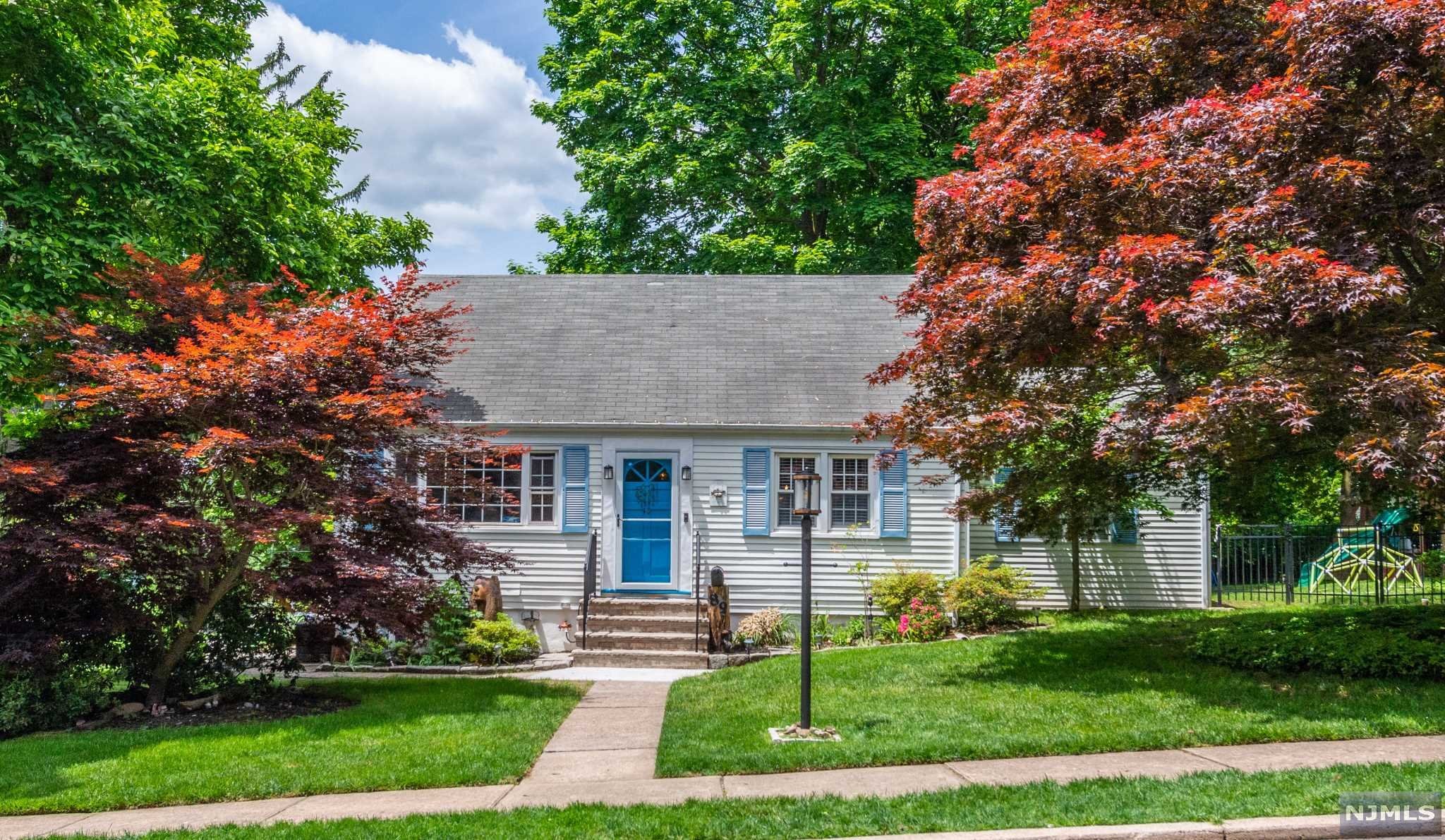 This sunny cape cod is located on a quiet street in beautiful Midland Park! Enter into the open living space that includes living room, sitting area, and dining room with sliding doors out to the rooftop back deck providing a great flow for entertaining. To the right, you'll find one bedroom located on the first floor. To the left, you'll pass the well-kept full bathroom and bright kitchen with new range and dishwasher. From the kitchen, you can go downstairs to more open space in the full finished basement with brand new full bathroom and garage access. Upstairs is a large bedroom with walk in closet which would make a great master bedroom. This is a gem in Midland Park- not to be missed!