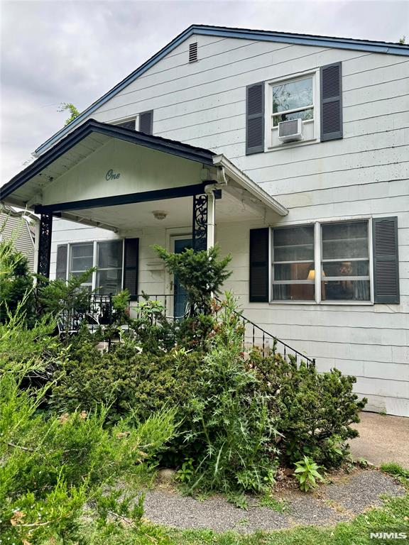 Welcome to 1 South Ave! This adorable 3 bedroom 2 bathroom colonial with original features sits on a picturesque quiet dead end block in one of the most desired towns in Bergen County. Perfectly positioned between the elementry school (10 minute walk) and the commuter bus station (5 minute walk), this home brings conveinence to every day living. Enter from the front porch right in to the living and dining rooms that lead to an oversized eat-in country kitchen with a walk in pantry. Next door, the family room opens to an outside deck. A full bathroom with vintage cast-iron tub completes the first floor. Upstairs the orignal hardwoods run throughout. Three nice-sized bedrooms await as well as a full bathroom. The huge primary bedroom features two walk-ins and room to add an ensuite bathroom. The basement hosts the laundry and has great ceiling hight and square footage to finsh off. Outside the cute low maintance yard offers the perfect amount of space to entertain and garden and with two driveways, there's lots of room to park! The elementary school is a highly rated Blue Ribbon school and the highschool is ranked #1 for Top Schools in NJ! Don't miss your chance to be part of this amazing neighborhood! Home is being sold-as.