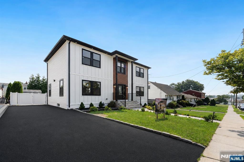 A stunning Center Hall Colonial offering 3, 000 square feet of luxurious living space is nearing completion and ready to make its market debut. Built on the existing foundation and fully gutted and completely renovated, this exceptional residence delivers the quality, craftsmanship, and feel of brand-new construction across three thoughtfully designed levels.Featuring 4 spacious bedrooms, every inch of this home has been meticulously designed with premium finishes, modern elegance, and functional living in mind. The open-concept layout is complemented by soaring ceilings, abundant natural light, designer fixtures, and upscale finishes throughout, creating an inviting atmosphere ideal for both everyday living and entertaining.The impressive exterior offers outstanding curb appeal with professionally designed landscaping, stately 18-foot columns, and a welcoming front entrance. Enjoy a spacious front yard and an expansive private backyard featuring an in-ground pool, storage shed, and full privacy fencing creating the perfect outdoor retreat for entertaining, relaxing, and making lasting memories. This rare turnkey opportunity combines the charm of a classic Center Hall Colonial with the comfort and efficiency of modern construction. Ideally suited for buyers seeking luxury, space, and exceptional quality, this home truly offers the best of contemporary living.