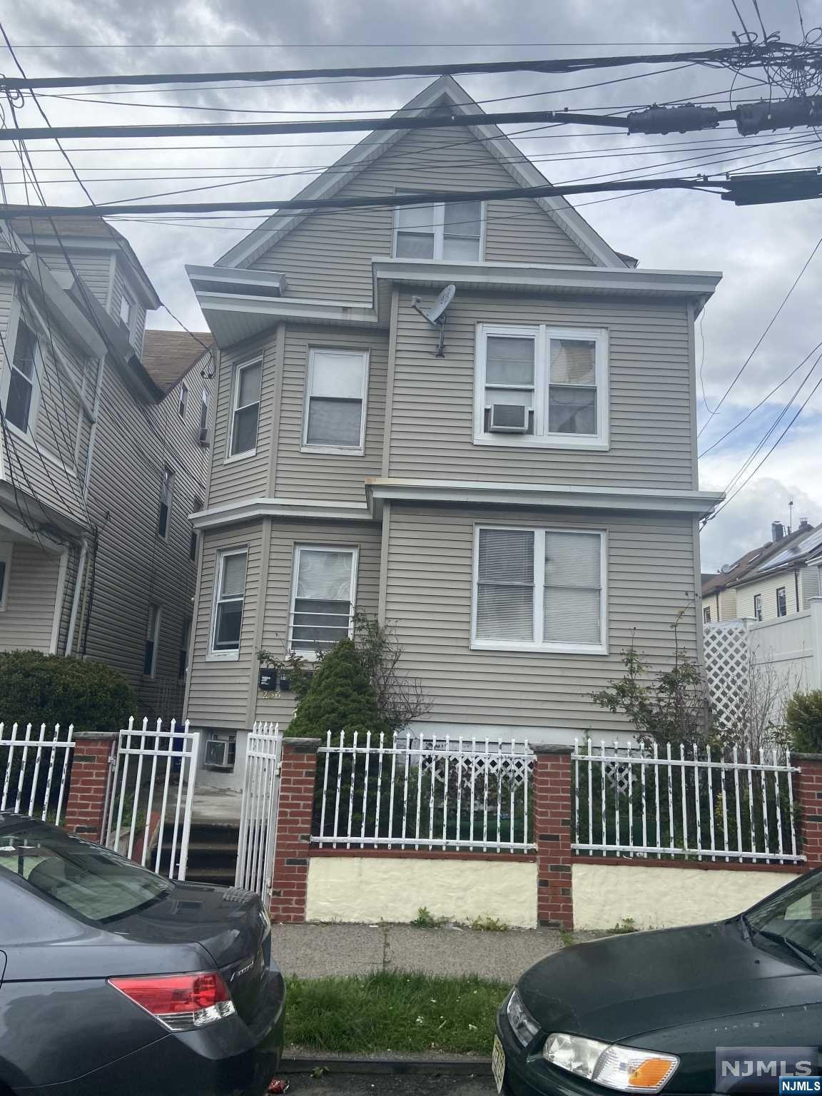 Two Family house in very good shape, quiet are of Paterson, close to Rt 80, good Location