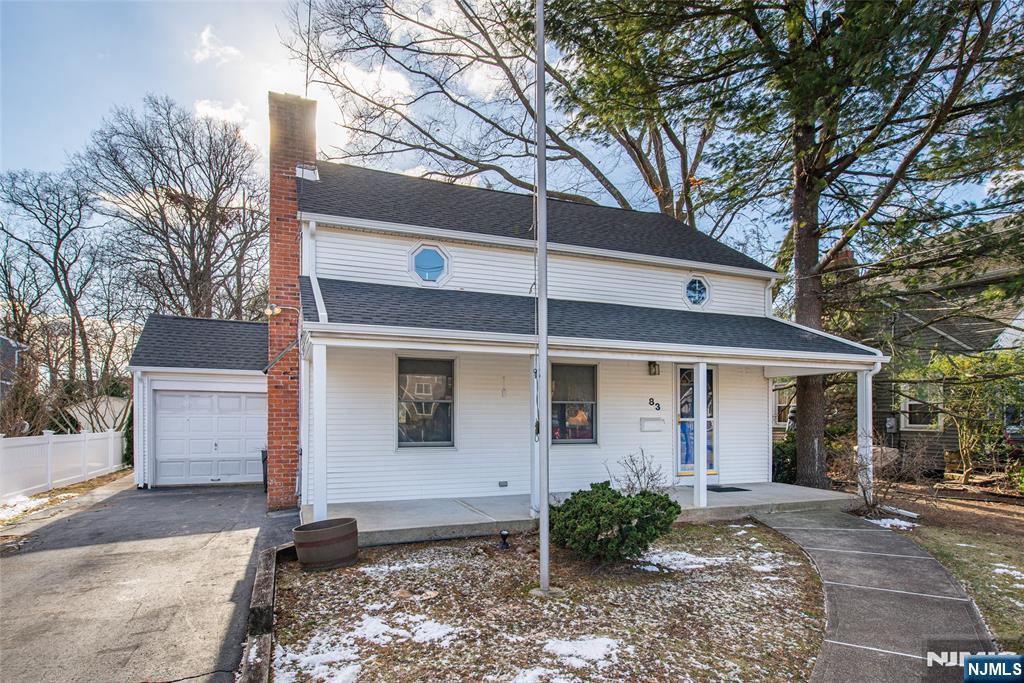 Opportunity knocks in Desirable Pompton Plains on Beautiful Hopper Ave! The Inviting Front Porch will Welcome you Home! This 3 Bedroom 1 and a Half Bathroom Colonial has an open floor plan. The Living Room boasts a wood burning fireplace with liner, open to the Dining Room , Den, and Kitchen with a double wall oven and gas cooktop. A Laundry Room and Half Bathroom complete the first floor. Upstairs you will find a generous size Full Bathroom, Primary Bedroom with a Double Closet , a Walk In Closet, Sliders to a 2nd Story Deck overlooking the beautiful back yard, and two more Bedrooms. The basement is finished ...has a tile floor , utility room and storage. The yard is fenced, level and has a patio area, gas hook up for grill ,a storage shed and underground sprinklers! Do not miss this one! NO FLOOD