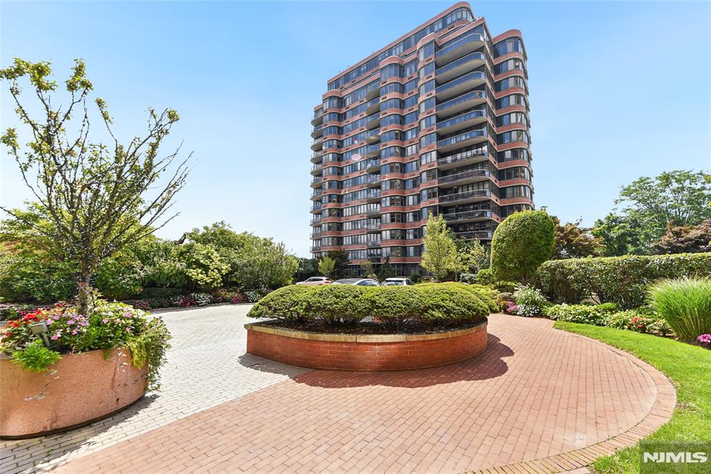 Welcome to luxury living at the prestigious Carlyle Towers on the Palisades! This beautifully maintained residence offers a spacious and functional layout, featuring sun-filled living and dining areas that open to a private terrace-perfect for enjoying breathtaking views of the Hudson River and New York City skyline. The home boasts high ceilings, generous room proportions, and a bright open- concept design ideal for both everyday living and entertaining. The kitchen is well- appointed with ample cabinetry and modern appliances, while the primary suite includes abundant closet space and a well-designed en-suite bath. Residents enjoy full-service, resort-style amenities including: 24-hour doorman & concierge, Valet parking, Outdoor pool, Fitness center & health club access, Residents' lounge, library & children's playroom Additional highlights include in-unit washer/dryer, indoor garage parking, and convenient access to NYC transportation just steps away. Located in one of Cliffside Park's most sought-after luxury buildings, this home offers the perfect blend of comfort, convenience, and elevated lifestyle living.