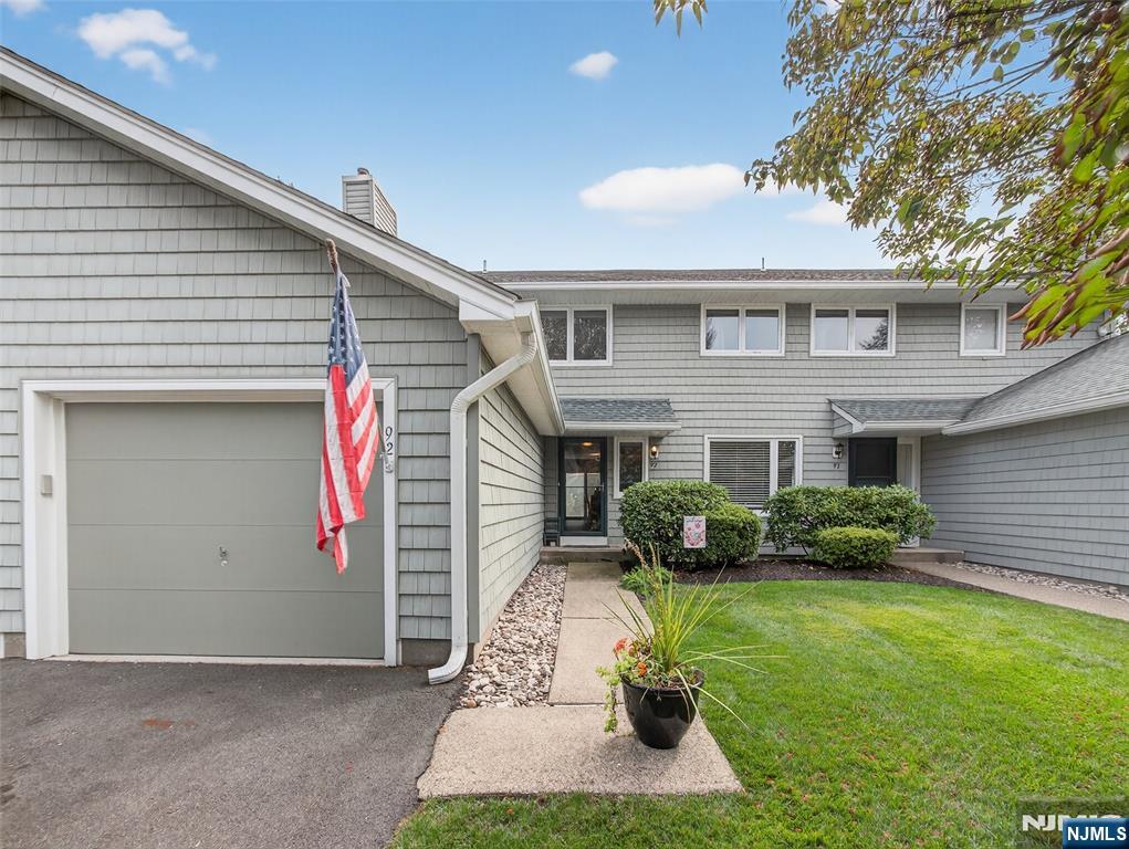 Welcome to this stunningly renovated townhouse in the highly sought-after Ramapo Ridge community! No detail has been overlooked. The spacious kitchen boasts quartz countertops, stainless steel appliances and maple cabinetry. The open-concept living and dining room centers around a striking gas fireplace with custom built-ins and elegant wall sconces, while sliding glass doors open to a private patioâ€”perfect for summer barbecues and outdoor entertaining. The first floor features stylish wood-vinyl flooring and a beautiful powder room. Upstairs, the primary suite includes a gorgeous renovated bath, complemented by a second large bedroom and an additional spa-like bathroom with a stall shower and soaking tub. The finished basement, complete with an electric fireplace, extra refrigerator, and microwave, provides the ultimate retreat for movie nights, game days or gatherings. A large laundry area with newer washer and dryer offers abundant storage. Additional highlights include a 1-car attached garage and access to Ramapo Ridgeâ€™s outstanding amenitiesâ€”pool, tennis, clubhouse, and moreâ€”all within a pet-friendly community. Nestled in the vibrant town of Mahwah, with top-rated schools, abundant recreation, low taxes and excellent commuter access. This home truly has it all. Donâ€™t miss your chance to call this beauty "home"!