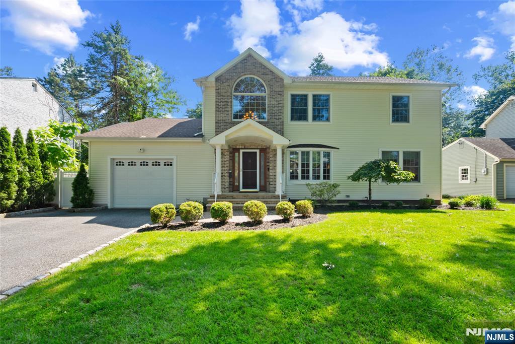 Welcome to this beautiful custom 4-bedroom, 2.5-bath home, completed in 2012 and ideally situated on the sought-after west side of Paramus. Designed for today's lifestyle, this move-in ready residence offers timeless style, modern functionality, and flexible living space. A dramatic two-story entry foyer welcomes you with abundant natural light. The beautifully appointed kitchen features abundant cabinetry, generous workspace, and an oversized butler's pantry for exceptional storage. A dedicated home office offers the flexibility to serve as a fifth bedroom, guest room, or playroom. An oversized first-floor laundry room with additional storage adds everyday convenience. Upstairs, the spacious primary suite features a luxurious four-piece bath, while three additional generously sized bedrooms provide ample space. Just off the second-floor landing, an expansive walk-in attic offers outstanding storage and exciting potential for a future bedroom, bonus room, or additional finished living space. Step outside to a spacious, fenced backyard featuring a beautiful two-tier paver patio, perfect for entertaining, outdoor dining, or relaxing. Ideally located on the highly desirable west side of Paramus, this exceptional home is moments from top-rated schools, parks, shopping, dining, and major highways, offering the quality and comfort of a newer home in one of Bergen County's most desirable neighborhoods.