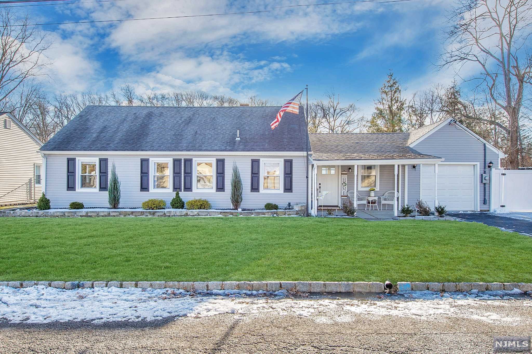 Open concept farmhouse inspired Fairfield ranch makes a first impression to remember. The heart of the home is the eye-catching ship lap entertainment center in the LR with a built-in electric fireplace. LR offers garage access & sliding door to the deck outside. Chic kitchen has black SS appliances, granite countertops & white subway tile backsplash. Gorgeous, engineered HW floors throughout. Primary BR is spacious with a full walk-in closet perfect for your wardrobe. Bathroom is newly renovated with storage shelves & stackable washer/dryer. Full attic the whole length of the house with cedar tongue and groove roof. Oversized garage & a half with plenty of room for a car and bonus storage space. This beautiful home has many new attributes, which include; siding, windows, flooring, kitchen, bathroom, HVAC, tankless HWH, driveway, electrical panel. Backyard is a summer paradise with a new above/in-ground salt water pool,PVC fence wood deck & Bluetooth controlled sprinkler system.