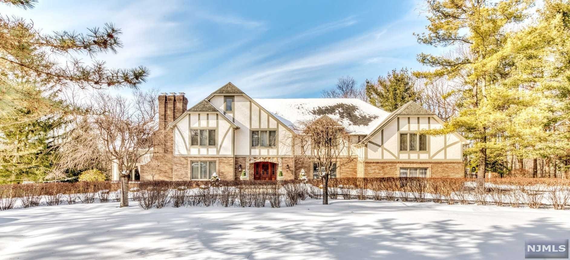 Can a 5,500 sq' home feel warm and welcoming? Absolutely! Sitting high on 1+ acres of beautifully landscaped property in the prestigious Winton Gate Estates area of Franklin Lakes. This gracious home has it all! Immediately, your guests will feel welcomed by the 2 story foyer with sweeping staircase & custom millwork that lead to the 2 story Gt Rm with stone FP & fl to ceiling windows. Truly a chef's delight the newer Gourmet Kitchen offers a bright eating area w windows overlooking the fabulous backyard; butlers pantry & Banquet DR. Double doors lead to second floor Master Suite w relaxing master bath retreat! 3 add'l BR(2 ensuite),FB, lounge area & rear staircase complete 2nd floor. Walk out lower level is finished with Rec Rm/FP, wet bar, gym area, Bonus Rm & FB! Ready to party yet? Well, when you see the private backyard oasis highlighted with heated pool,cabana,covered BBQ area, gazebo & w circular driveway..all only 30 miles from NYC, you'll say, 'Wow!'..and,we'll act fast!