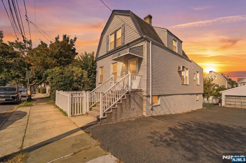 Opportunity awaits in this charming Sidehall Colonial featuring 2 bedrooms and 2 full bathrooms across a practical and inviting floor plan. The first floor offers a comfortable living room, formal dining room, eat-in kitchen, bedroom, full bathroom, and laundry room for added convenience. Upstairs, you'll find a spacious primary suite with a private full bath and sitting area. The finished basement adds two additional finished rooms, offering flexible space. Conveniently located near schools, shopping, restaurants, parks, and public transportation, this home offers both comfort and accessibility.