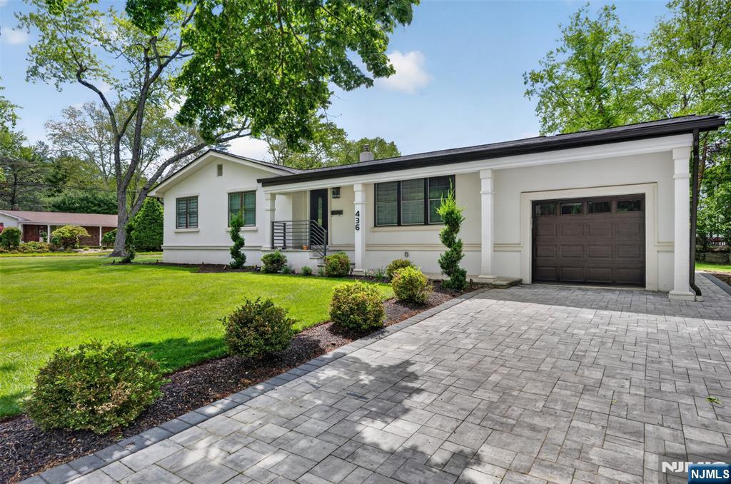 Stunning, totally renovated ranch featuring 3 bedrooms and 2.5 bathrooms on a large corner property in the ultra-desirable and prestigious East Hill of Closter! This property offers an exceptional setting that is highly sought after by both end users and builders alike. Incredible future potential, including the possibility to expand with a second-story addition while still maintaining plenty of backyard space for a pool and outdoor entertaining areas, creating the opportunity for a truly spectacular custom home. As it currently stands, it is beautifully updated inside and out and totally move in ready. Airy vaulted ceilings that greet you upon entry into the spacious living and dining rooms. Gorgeous fully renovated kitchen features quartz countertops, professional-grade Bertazzoni appliances, built-in microwave, abundant cabinetry, and space for a coffee bar. The main level offers true easy one-floor living with 3 bedrooms and 2 full bathrooms, including a beautiful primary with renovated en-suite bath. 2 additional bedrooms share a stunning updated hallway bath. Fully finished basement offers a large rec room, beautiful marble-look tile flooring, oversized laundry room, & convenient powder room. Large flat backyard with paver patio creates the perfect outdoor space. Absolutely nothing to do but move right into this incredible home located in one of Bergen Countyâ€™s most desirable towns with top-rated schools and a wonderful community atmosphere.