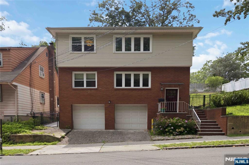 Spacious & Move-In Ready â€“ 3 Bed, 2 Bath. 1st floor Unit! Welcome home to this beautifully updated unit offering 3 bedrooms and 2 full bathrooms, with a kitchen and bathrooms remodeled approximately 5 years ago, modern finishes throughout, ready for you to settle right in. Enjoy the convenience of full garage access, an in-unit washer/dryer, and your own backyard access for morning coffee or weekend BBQs. Additional storage is available with limited basement access. Stay comfortable year-round with mini-split and window AC units for efficient, zoned climate control. A wonderful blend of space, comfort, and everyday convenience. Schedule your showing today! OPEN HOUSE SATURDAY 07/25/2026 1:00-3-00PM