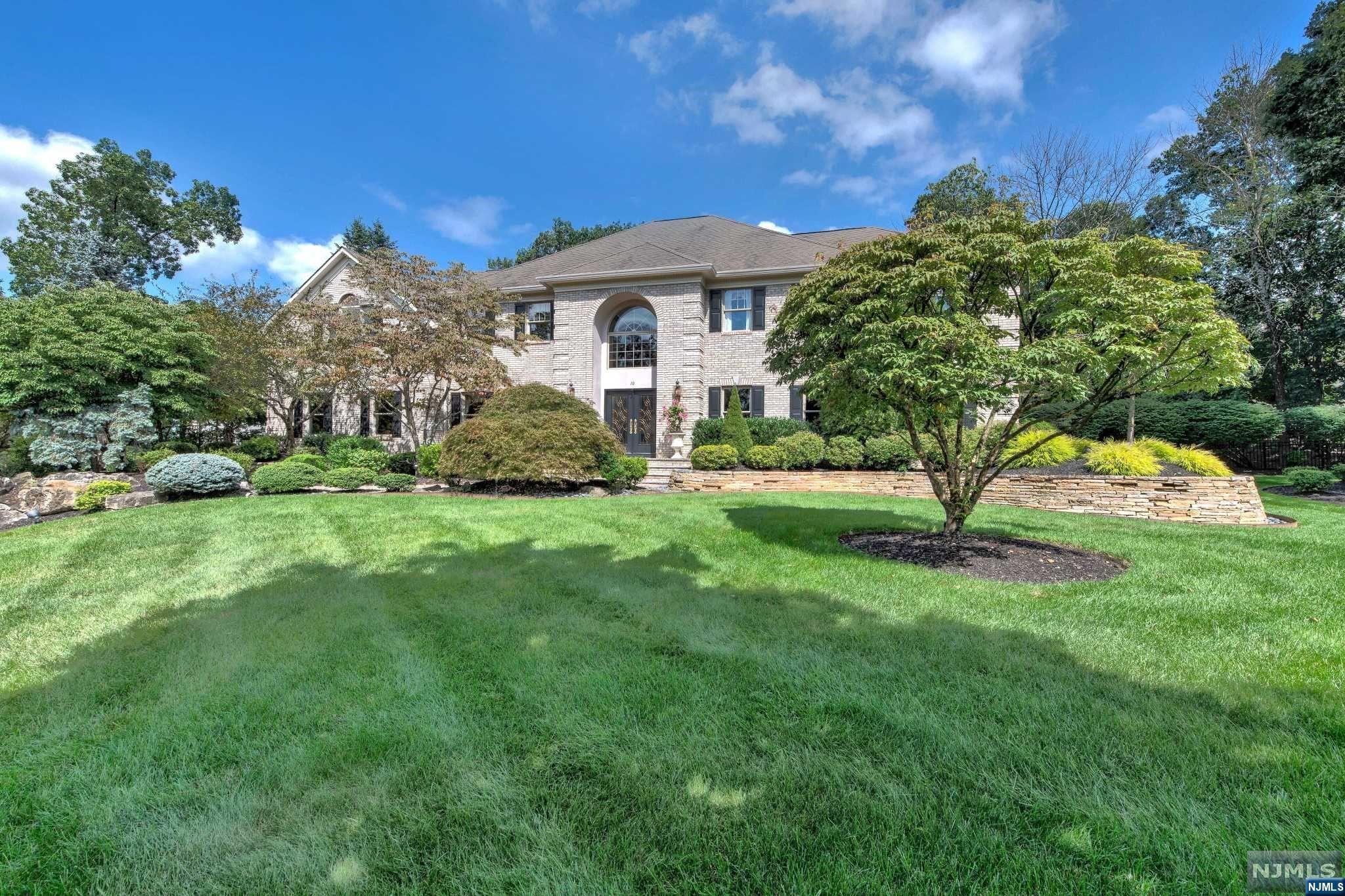 Situated in highly sought-after Towaco neighborhood, this exquisite real estate gem offers a prime location and luxury living at its best! Recently renovated and designed by renowned interior expert.No expense has been spared in creating this unparalleled residence.Marbled floor entry foyer with sweeping staircase.Beautiful custom kitchen with center island,Sub-Zero and LA CORNUE appliances.Gorgeous primary suite with sitting room, two custom closets and luxury bathroom.Every inch of this home exudes elegance and sophistication, from soaring ceilings to the custom chandeliers and designer windows.Enjoy seamless indoor/outdoor living with French doors opening to beautifully landscaped grounds. Just minutes away from Towaco train station.