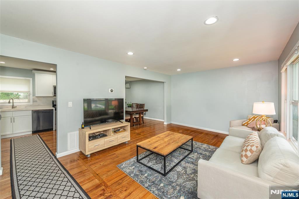 BIGGER THAN IT LOOKS! Check out this beautifully updated 3 Bedroom, 2.5 Bath Colonial with Central Air, Eat-In-Kitchen & stainless steel appliances, separate dining room, 1st floor laundry/mud room, partially finished basement, 1 car garage, large backyard and hardwood floors. Master suite with custom designed bathroom and walk-in closet. Great location, perfect for commuting, entertainment, schools, parks and everything in between!