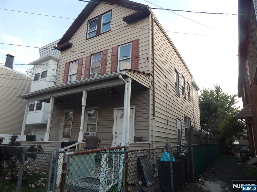 This house has 2 bedrooms per floor, plus a finished attic with 2 rooms and a full bathroom, a finished basement with a full bathroom also. Separated utilities. Come and see for yourself the huge potential this house has. House is being sold AS IS.