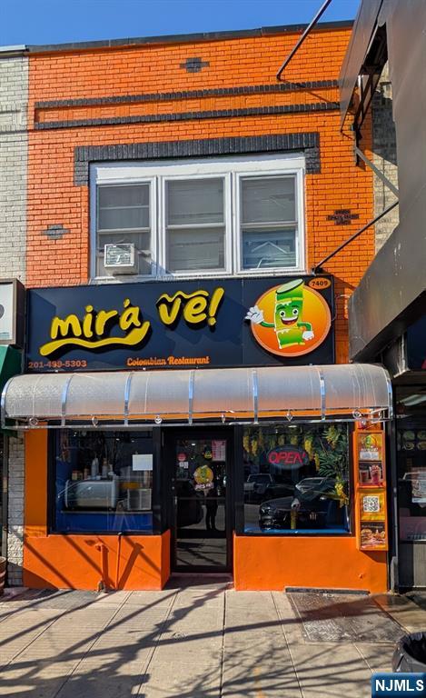Prime Mixed-Use Opportunity on Broadway! Well-located mixed-use property in a high-traffic Broadway corridor, just a few blocks from Braddock North Hudson County Park. The building consists of one retail unit and one residential unit, both fully occupied and currently on month-to-month leases with below-market rents, offering immediate upside potential. The retail space is home to a well-established Colombian restaurant, featuring a bathroom, full commercial kitchen, walk-in refrigerator, and a large high-ceiling basement ideal for storage, plus an additional bathroom. The residential unit offers three spacious bedrooms, including a primary bedroom with en-suite bath, and two full bathrooms in total. Both tenants are open to executing long-term leases at market rents with the new owner, making this an ideal asset for investors or owner-users seeking stable income with value-add potential in a prime location.