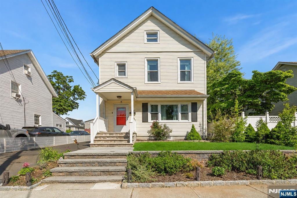 The opportunity you've been waiting for in Englewood! This beautifully updated Colonial welcomes you with wonderful curb appeal on a quiet block just minutes from downtown shopping, dining, and everyday conveniences. From the moment you enter, soaring ceilings and rich hardwood floors create a warm, inviting atmosphere filled with character and natural light. The kitchen is a true standout featuring a center island, granite countertops, ample cabinets, a water filtration system with an insta-hot dispenser (2025), newer refrigerator (2024), and an ideal layout for entertaining. A mudroom with extra storage and a full bathroom adds functionality to the main level. Upstairs, youâ€™ll find 3 well-appointed bedrooms with excellent natural light and an additional full bathroom. The home features a full attic with insulated, finished walls, new pull-down stairs (2025), and architectural plans for a future permanent staircase conversion. The finished basement provides valuable bonus space perfect for a recreation room, home office, or gym, complete with another full bath. Additional highlights include a newer hot water heater (2022), central air, a Vivint security system, and a brand-new custom garage door to be installed. Enjoy a low-maintenance brick patio, plus a detached two-car garage and long driveway. Conveniently located near houses of worship, schools, parks, Englewood Hospital, major highways, and the GWB for an easy Manhattan commute. Move-in ready and exceptional value!