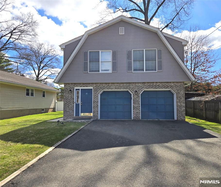 Great location! Beautifully maintained mother-daughter home with newer Roof and newer AC - 4 beds and 2 baths. Additional family room on the lower level, with patio and backyard perfect for summer barbecues. Well-maintained lawn with zoned sprinkler, 2 car garage with 4 additional parking spaces. 1/2 hr from NYC with great school district. Move-in ready, freshly painted with hardwood flooring.