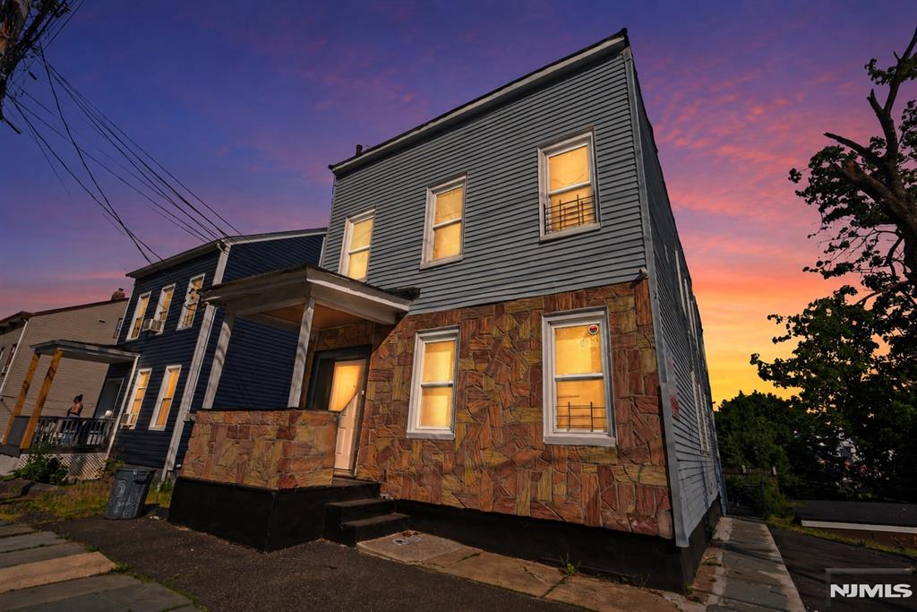 Welcome to this well-maintained 2-family home located in the heart of Paterson. This property features two spacious 3-bedroom units, offering a fantastic opportunity for both investors and owner-occupants alike. Each unit provides a functional layout with generous living space and abundant natural light. The property also includes a detached 2-car garage, separate utilities, and a full unfinished basement with walk-out access offering additional storage potential. Conveniently located near transportation, shopping, schools. Property will be delivered vacant, making it ideal for immediate occupancy or market rents. Donâ€™t miss the opportunity to own a versatile multi-family property with strong income potential.