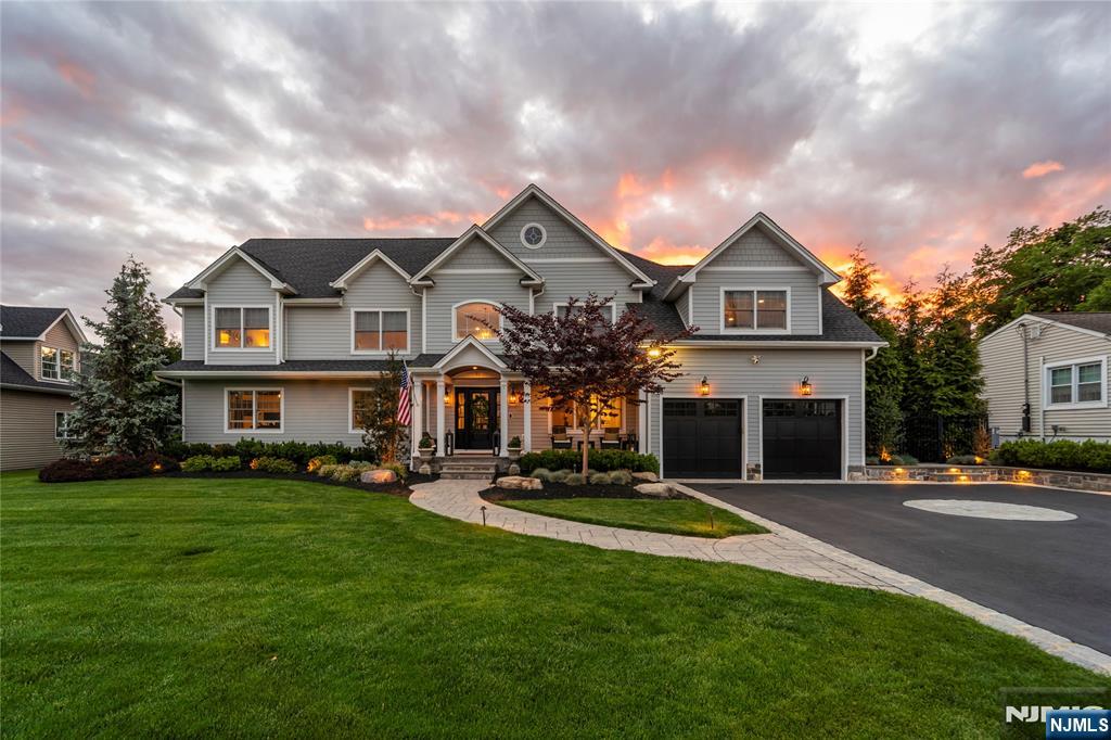 Welcome to 11 Amelia Drive in Old Tappan - a fully upgraded smart luxury residence designed for elevated everyday living and exceptional entertaining. This meticulously customized home blends sophisticated indoor spaces with resort-style outdoor amenities, featuring a heated pool and spa with waterfalls, landscape lighting, outdoor speakers, in-ground trampoline, designer landscaping, dog run, and a stunning Trex deck anchored by a four-season smart pergola with recessed lighting, heaters, fans, and motorized retractable screens for effortless indoor-outdoor living. The outdoor kitchen includes dual refrigerators, sink, built-in side burner, gas fireplace, and 65" outdoor TV for seamless entertaining. Inside, enjoy custom window treatments, motorized foyer chandelier lift, Sonos theater surround sound, smart environmental controls, Samsung smart appliances, and bifold ORIGIN doors opening effortlessly to outdoor living spaces. The finished lower level offers recreation and fitness areas complete with gym equipment, air hockey, foosball, and media lounge. Additional highlights include a full-house generator, security system, whole-house water filtration and water softener systems, sprinkler system, leaf-free gutters, heated/cooled garage, and premium smart home technology throughout.