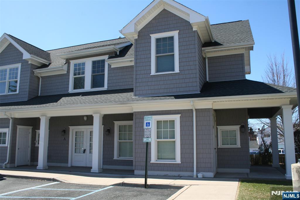 Custom designed 2 bedroom/1.5 bath end-unit apartment with open floor plan and high end finishes. Granite counters, stainless steel appliances, washer/dryer in unit. Storage closet for bikes, etc. Private patios off of the living room and primary bedroom. Onsite parking. Close to shopping and transportation. NO SMOKING AND NO PETS PERMITTED.