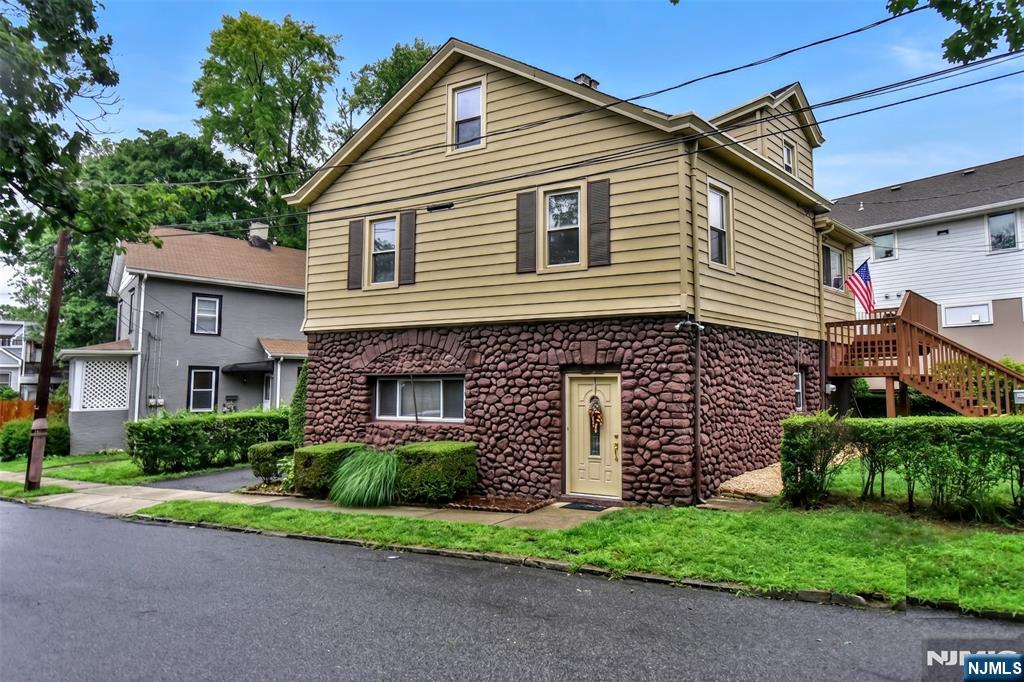 Versatile and full of potential, this unique three-level home offers a flexible floor plan designed to accommodate a variety of lifestyle needs. The ground level features a spacious family room that can also serve as a fourth bedroom, a kitchenette with dining area, a full bath, and access to the backyard patio - making it an ideal space for extended living, guests, or a private home office. The main living level offers a comfortable living room, kitchen, dining room with sliding glass doors leading to a generously sized deck, two bedrooms, a full bath, and convenient laundry room. The third level provides a private third bedroom along with a separate sitting room or home office, creating an ideal retreat with additional flexible living space. Additional features include a three-car driveway and multiple outdoor spaces to enjoy. Conveniently located near the Waldwick NJ Transit train station, shopping, restaurants, and local amenities, this home also offers easy access to major highways and is situated within Waldwick's highly regarded school district. A wonderful opportunity to own a home with space, flexibility, and an unbeatable commuter-friendly location.