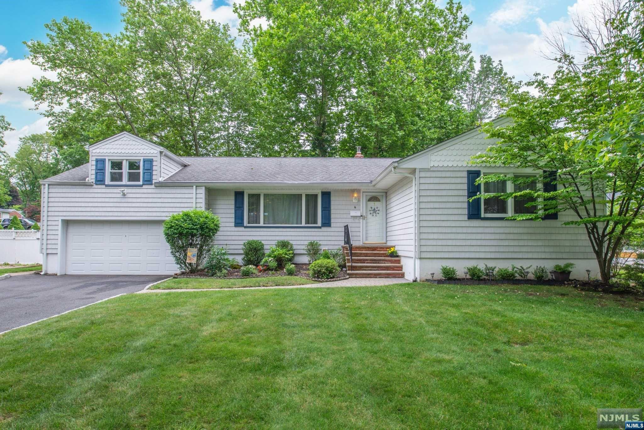 Move right in to this beautiful, well maintained sun-filled raised ranch! Situated on a gorgeous level lot in a desirable neighborhood. The easy-flowing floor plan offers 4 beds, 2 baths. Open kitchen with stainless steel appliances overlooks the living room and dining area. Bright sun filled family room/sunroom, 2 car garage, finished basement and an expansive deck - perfect for entertaining a crowd! Gorgeous hardwood floors, new finished basement with plenty of storage. Newer furnace, hot water heater, chimney, and central air. This is a commuter's delight - get the NYC bus just down the street, walk to nearby Verona Park, Houses of Worship and golf courses. A quick Uber ride to the bustling and vibrant downtown Montclair. Just minutes away from Rt. 280, GS Parkway & NJ Turnpike.