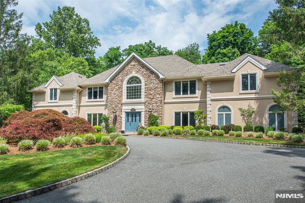 Welcome to this stunning Saddle River Estate situated on 2.3 acres with 6-car Garage. Set back over 700 feet from the road and surrounded by multi-acre estates, this residence offers the ultimate in privacy! After entering the elegant, 2-story Foyer, you are led to the Great Room feat. Vaulted Ceil., Wood FPL, Wet Bar & French Doors to a Paver Patio â€¦ wonderful for entertaining! The adjacent Chefâ€™s Kitchen was designed by natâ€™l award winner, Peter Salerno. Appl. incl. SubZero, Wolf & Miele. The Kitchen also offers a Bkfst Rm with Skylights & Walk-In Pantry while the DR is able to host large gatherings. The main level also offers a LR (aka Golf Simulator Rm) opening to the Great Rm, a Library w/adjacent Sunrm (aka Gym), a Guest Bath & an En-Suite BR. On the 2nd FL, you have a MBR Suite w/Tray Ceil., two XL W-I-C, Sitting Rm and lux MBA also designed by Peter Salerno w/oversized Shower, Jetted Tub & Heated Flrs. Rounding out the 2nd FL are BR/BA/BR and BR/BA/BR & Laundry. The LL is an Entertainerâ€™s Paradise feat. Home Theater ($150,000+), Wine Room, Infrared Sauna & 42â€™ Rec Rm. Addâ€™l Upgrades incl. Generator (22kw) & Reverse Osmosis Filtration Sys. (see Features List for more Upgrades)!! Of course, car lovers will delight in the 6-car Garage! The Prof. Ldscpâ€™d property offers Ldscp Liting, Spklrs & Belgium Block lined Circular Drive. Plus, Pool Plans are avail. (permit needed). Only 3 mi to NYC Train! Last but not least, low Saddle River taxes of just $24,764/year