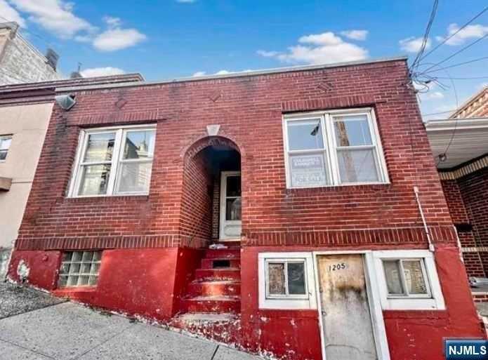 Welcome to this charming two-unit rowhouse nestled in North Bergen and near Union City, offering a fantastic opportunity for both investors and homeowners alike. This solid brick home exudes potential and promises a bright future with a cosmetic renovation and a few repairs. The spacious kitchen opens up to endless possibilities for culinary creativity. The bedrooms offer comfort, space and potential for imaginative design, and the bathroom is primed for a rejuvenating makeover. Outside, the property features a huge backyard which is perfect for creating a private urban retreat. Imagine relaxing evenings under clear skies or entertaining guests in this fantastic outdoor space. Located just a few blocks from Bergenline Avenue and Kennedy Boulevard, this home is near an array of amenities, including trendy cafes, local shops, and public transportation options. Commute to various areas in New Jersey via the New Jersey Turnpike and/or Route 9 or make your way into New York City