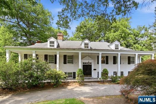 Welcome to this spacious custom-built lakefront bi-level nestled in the highly desirable Carriage Lane area of Wyckoff. Offering 3 levels of living space, this 5br, 3.5 bath home presents a rare opportunity to create your dream waterfront retreat. Set on a picturesque lakefront property, with stunning water views from nearly every room. Entertain in your private backyard oasis featuring a beautiful inground pool, brand-new decking overlooking the tranquil lake. The lower level offers a large family room with a fireplace, a private office/library, and direct access to the patio, pool area, and lakefront setting. The main living level showcases a spacious living room with fireplace, new flooring, a formal dining room, and an eat-in kitchen highlighted by a huge picture window framing the serene lake views. This level also includes the primary bedroom suite with private bath, a second bedroom, an additional full bath. The upper level features three generously sized bedrooms and another full bath, providing ample space for family and guests. Plus attic storage. A two-car garage completes the home. Bring your contractor, designer, or decorating ideas! This exceptional property is ready for its next owner to update and personalize it to their own taste and style. With solid construction, an outstanding floor plan, breathtaking lakefront views, and one of Wyckoff's most sought-after locations, this home offers unlimited potential to become a truly spectacular residence.