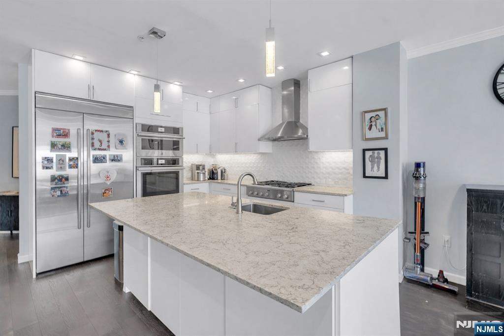 Easily the most attractive unit in this waterfront community! Top-floor unit with stunning NYC views from the master bedroom and living room. This unit was completely gut-renovated with top-of-the-line appliances just a few years ago and offers a massive 1,751 sq ft of living space. You wonâ€™t find this level of finishes, views, and square footage at this price point anywhere on the waterfront. Amenities include two covered parking, gym, jacuzzi, and tenant lounge.