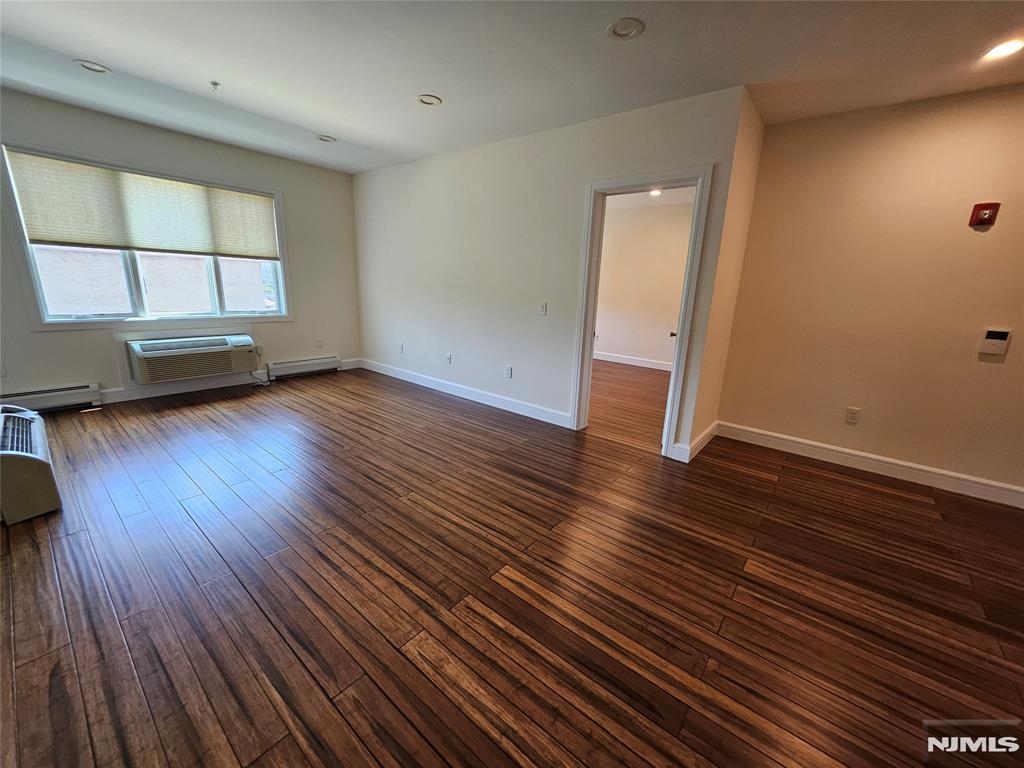 SPACIOUS 2 BEDROOM PLUS DEN AND 2 FULL BATHROOMS. HARDWOOD FLOORS THROUGHOUT. STAINLESS STEEL APPLIANCES INTHE KITCHEN, LOTS OF CABINET SPACE AND LARGE ISLAND WITH SEATING FOR 5+ WASHER AND DRYER IN UNIT, 1 PARKING SPACE INCLUDED. MANY RESTAURANTS, CAFE IN THE AREA AND WALKING DISTANCE TO SHOPRITE, OVERPECK PARK AND EASY ACCESS TO MAJOR HIGHWAYS
