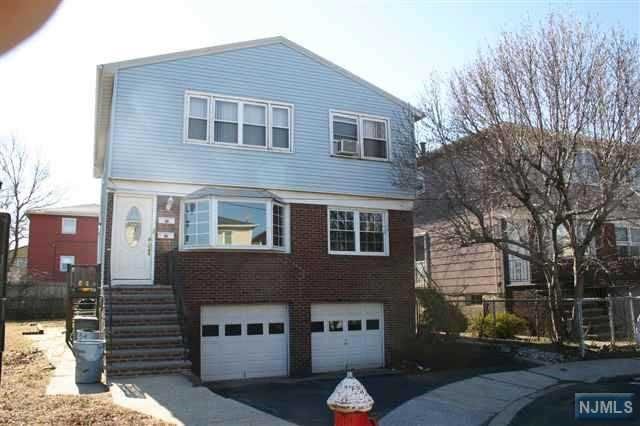 2 family house with 3 bedrooms on each floor, 1 bathroom, 2 car garage with parking in the front. Close to the park. Great investment opportunity!
