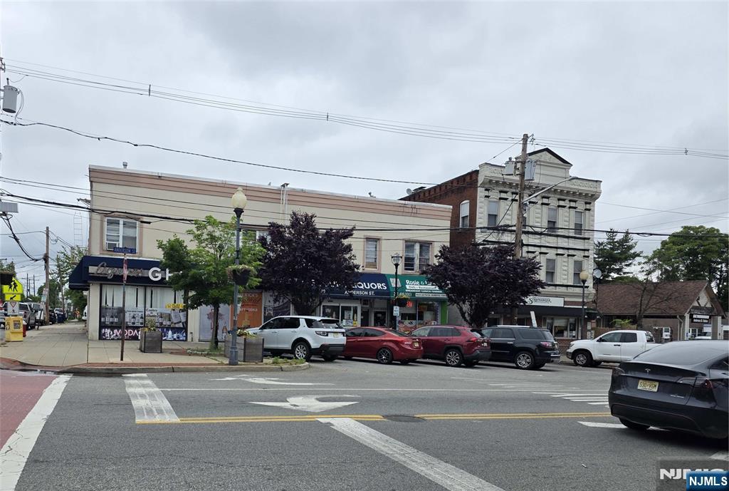 Location ! Location ! Location ! Next to the Anderson trains station. Steady rental income ( NOI $ 180 K ) from 2 retail tenants ( one discount Liquor store and another deli restaurant ) on the 1st floor plus 6 unit Apts on the 2nd floor ( 2 unts 1 bed + 4 units studio). Nearby about 3,000 new residential units being completed and constructed in the Hackensack downtown development area. Another new construction of 200 units apt will be started soonest across the street ( previous Walgreen property ). The Opportunity Zone map show this property in the OZ !