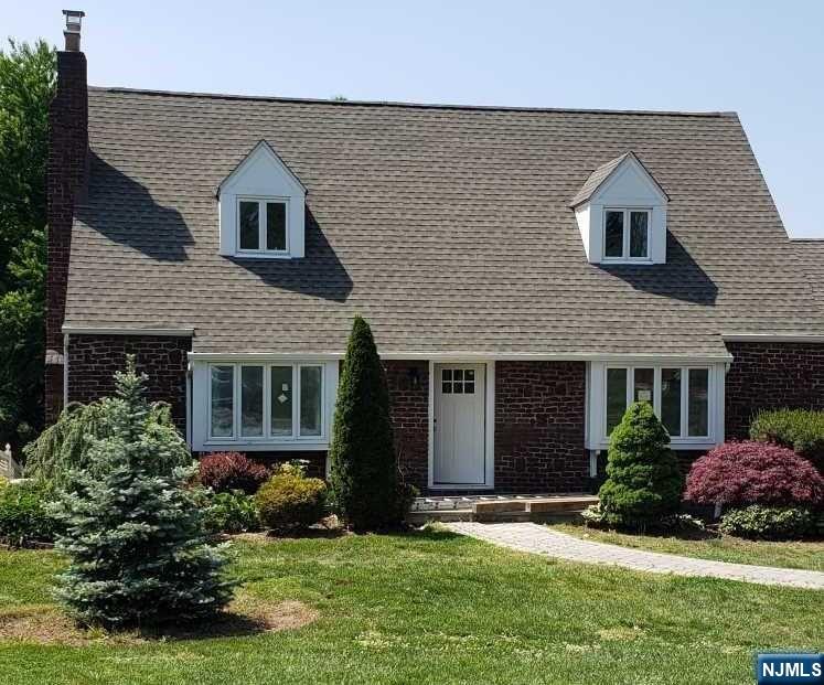 Welcome to this captivating Cape Cod home in Englewood, NJ! Fully renovated, this 3-bed, 3.5-bath residence boasts an open layout, fenced private yard, and a prime location just 1 1/2 miles from the Bridge. Step inside to discover a seamless flow, a cozy living room fireplace, and a stylish dining room. The modern kitchen features an island and eat-in area, while the great room offers another fireplace for relaxation and entertainment. Upstairs, two large bedrooms and a full bath provide comfort and privacy. The lower level includes a spacious room, full bath, laundry, and separate entry. Extras like an extra refrigerator and generator enhance convenience. With a perfect blend of old charm and contemporary allure, this Englewood gem is a must-see!