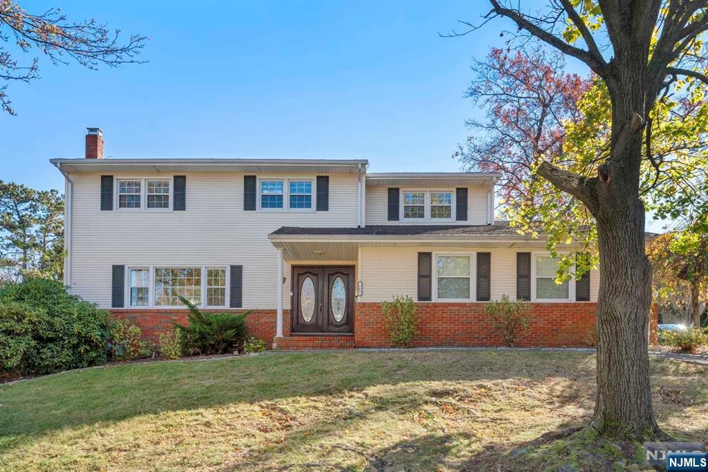 Welcome to a beautifully renovated residence at Englewood Cliffs. Come enjoy a gut-renovated kitchen with brand new cabinetry, remodeled bathrooms, all new appliances, refinished hardwood floors, EV charging station, upgraded ceiling lightings, and more! The open layout kitchen with a living room, formal dining room and family room. From the eat-in kitchen, sliding glass doors lead to an inviting outdoor deck, perfect for dining al fresco or hosting events. Go upstairs to find a Primary bedroom with a newly renovated bathroom and a walk-in closet. There are also three additional spacious bedrooms along with a renovated bathroom and double vanity. The lower level features an open entertainment room with plenty of storage. Non-Smoking. Rent includes furniture. The house is conveniently located near major highways and within walking distance to school, NJ transit bus stops, parks, shops, and restaurants.
