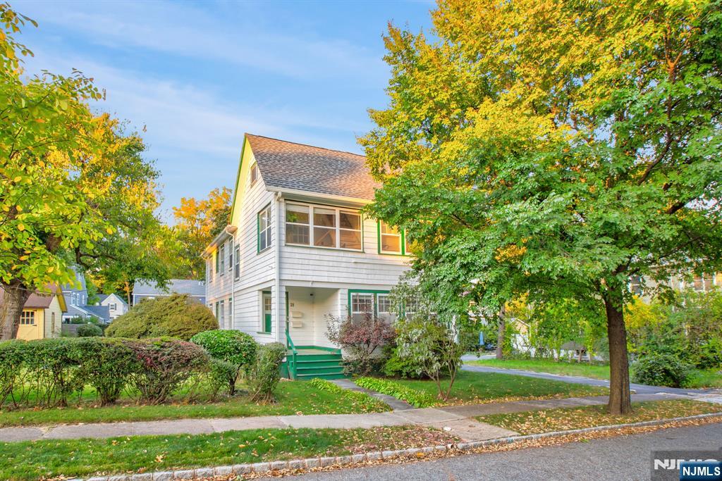 Looking for more than just a typical apartment? This light-filled two-level home offers character, space, and flexibility at every turn. Updated throughout, this unit features a refreshed kitchen with new appliances, a fully renovated bathroom and is freshly painted. The spacious living room features a functioning fireplace, while a sunny bonus room provides the perfect space for a home office, den, or studio. The separate dining room provides a perfect space for entertaining and the kitchen features plenty of countertop space for preparing meals. A large third-floor recreation space offers endless possibilities for entertaining, hanging out, playing pool, or creating a media room, plus an additional storage room. Additional highlights include your own private washer and dryer in the basement, two tandem driveway parking spaces, and a PET FRIENDLY policy! Conveniently located near parks, shopping, dining, and transportation, this sunny and inviting home combines character, flexibility, and everyday convenience.