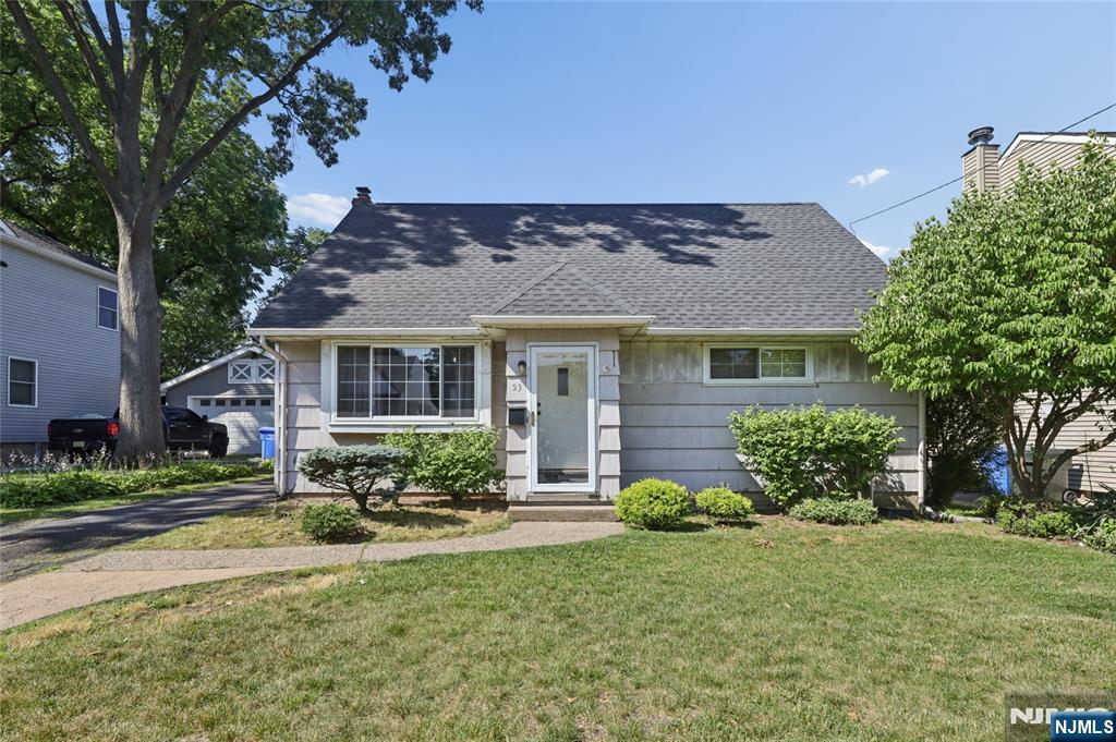 Welcome to this well-maintained 4-bedroom, 2-bathroom home, located on a quiet tree lined street in the desirable town of Rutherford. The inviting first floor features a spacious living room that flows seamlessly into the eat-in kitchen and dining room with a cozy gas fireplace and direct access to the backyard, creating the perfect layout for everyday living and entertaining. Two generously sized bedrooms, a full bathroom, and ample closet space complete the main level. The second floor offers two additional spacious bedrooms and full bath. Additional features include hardwood floors on the first level, central air conditioning, and a full partially finished basement with office, laundry area, and a large pantry. A long driveway accommodates up to three cars. Conveniently located near parks, schools, shopping, restaurants, and public transportation, this home offers comfort, space, and an exceptional location not in flood zone. Donâ€™t miss this wonderful opportunity!