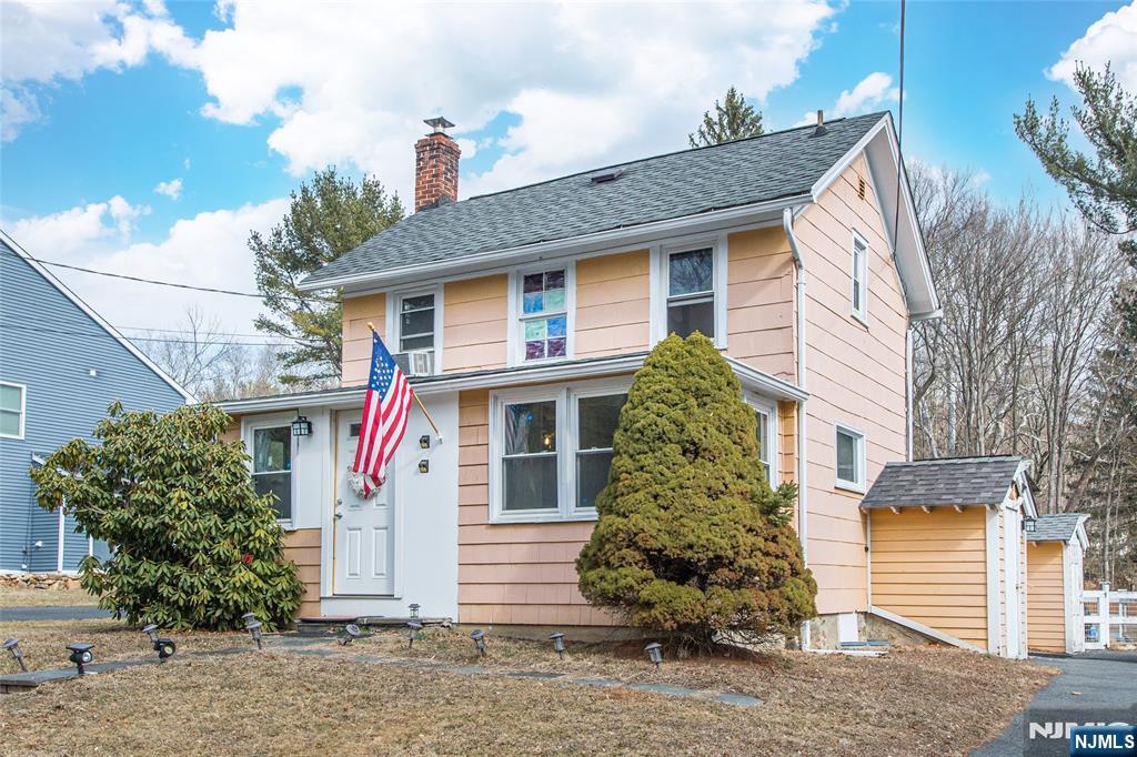 Welcome to this two-bedroom, two-full-bath home in the heart of Mount Olive in the Flanders Section. Open and Bright! This main level has a large kitchen, fabulous open living room with a propane fireplace and built-in storage, dining room, laundry room with new washer and dryer, access to the backyard/deck, a nice-sized bedroom, and full bath. The second floor has a large bedroom with high ceilings, a walk in closet and a full bath - making this a complete private suite! There is a great finished space/den/playroom/excercise room/office in the walk out basement. The large entry foyer can double as an office space. The yard is fully fenced and level ready to entertain all your guests! Covered Deck! Firepit! All appliances will stay. Bedroom and full bath on the main level for easy living. Don't miss this great home in Flanders! Close to highways and town! Great Schools! All furniture is negotiable.