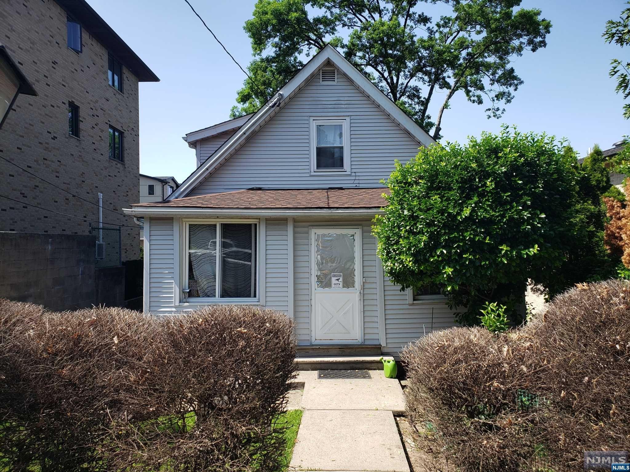 Cape Cod on 40 x 100 Lot in Palisades Park, Builders are Welcome, Build a New House or Fully Renovate. 1FL: Enclosed Front Porch, Living Room, Dining Room, Kitchen, BR, Full Bath, Laundry, Deck. 2FL: 2BRs, Half Bath, Storage Room. Finished Basement, Separate Entrance, Family Room, Summer Kitchen, BR, Bath, Laundry, Utility. Nice Back Yard, Conv Located Close to Shops, Restaurants, NYC Bus, Close to GW Bridge and All Major Highways( Rt. 46, 95 & 80 ). Property is being sold As-is.