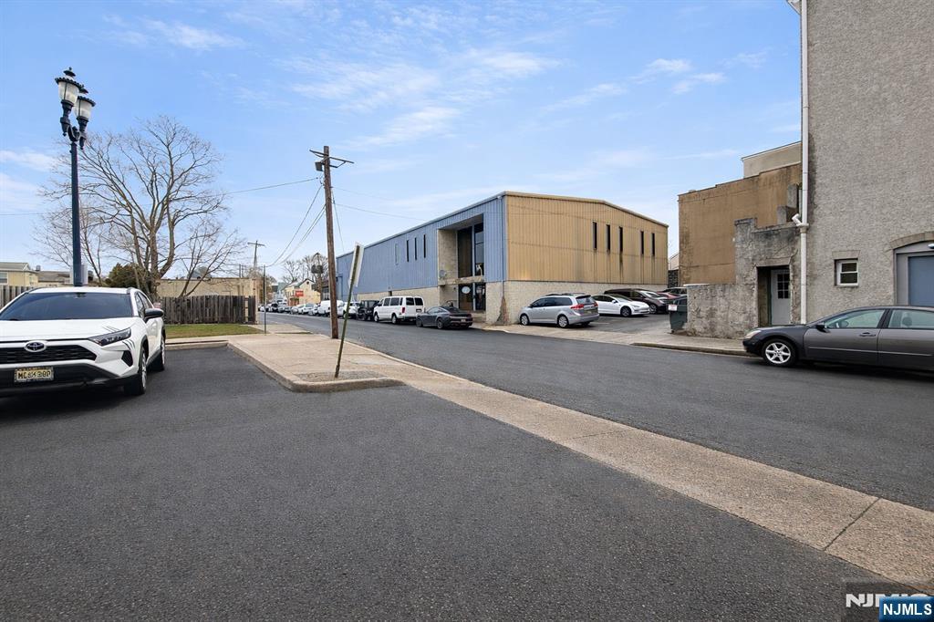 This Somerset County facility is a turnkey solution for large-scale bakery production or food manufacturing. Spanning a generous 16,740 sq. ft. lot, the property is strategically located with immediate access to Route 22, providing seamless logistics to Routes 78 and 287. Impressive 25-ft clear ceilings and a dedicated drive-in loading dock. Fully equipped with an industrial walk-in freezer and refrigerator. Includes professional-grade industrial ovens and a suite of baking equipment. Large receiving room and 10 dedicated parking spaces located directly across from the property. A full second level featuring 7 private offices, 2 conference rooms, a coffee break room, and 2 restrooms. An on-site display and storefront area, perfect for direct-to-consumer sales or a flagship showroom. In addition, there are 2 Vaults Onsite, 1 is 10.5ftx12.5ft and the other 18ftx12.5ft. Whether you're looking to expand an existing food brand or launch a centralized distribution hub, this versatile property offers the infrastructure to scale immediately.