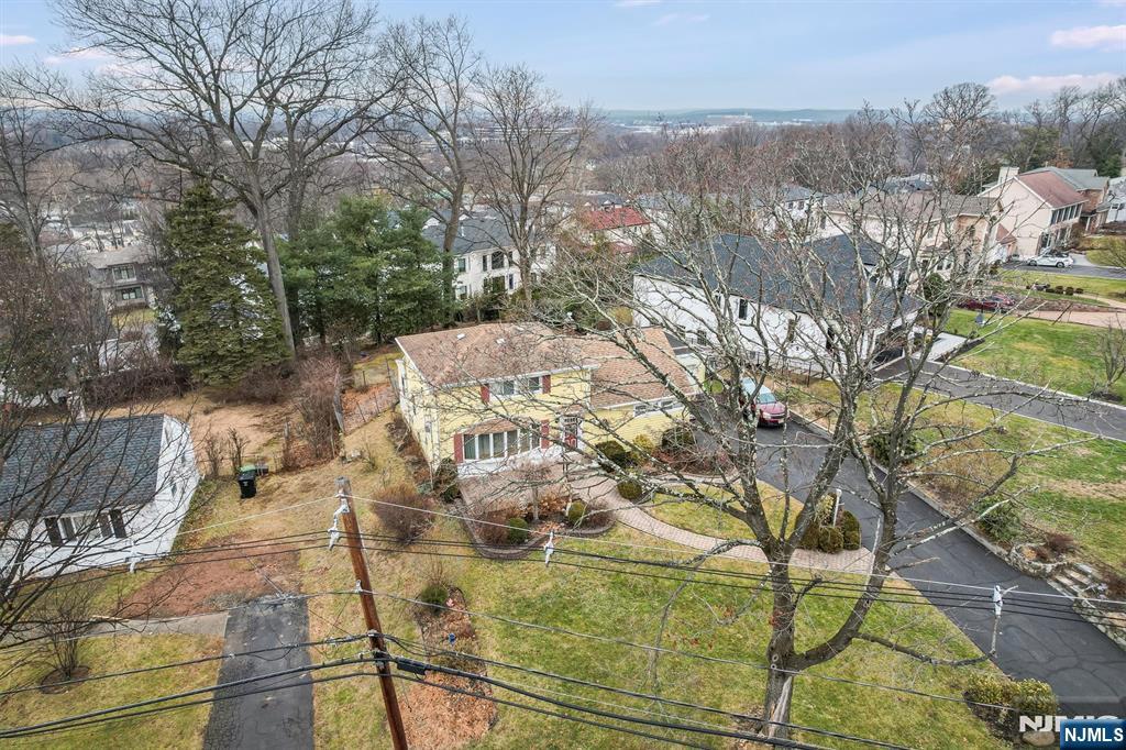 Calling all builders/contractors...this expanded cape home sits on a 9,816 Sq ft lot on a fabulous block. Renovate existing home or build new. Being sold strictly As-Is w/decommissioned tank in ground. Buyer responsible for CCO and all required certificates.