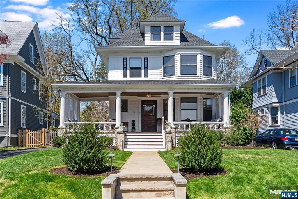 Exuding beauty, charm, and warmth, this 1910 Colonial is a rare gem in the heart of Glen Ridge's storybook neighborhood. Thoughtfully updated to complement today's lifestyle, blending original architectural details with modern sophistication. The front porch is perfect for summer evenings relaxing or entertaining. Step inside to the foyer that showcases exquisite craftsmanship, flowing effortlessly to the LR and DR. The updated EIK features granite countertops, ss appl, ample cabinetry and butler's pantry, perfectly positioned to step outside to the bluestone patio & yard. The 2nd fl offers 4 large BR's and hall bath. Retreat to the 3rd fl ensuite with a beautiful Bath and glass-enclosed shower. Finished bsmt incls laundry, family room and 3rd full bath. All new landscaping & sprinklers, roof, upgraded electrical, & new split duct AC. One block to Linden Ave School & playground and minutes to two NYC-direct train stations, top-ranked schools, and Montclair's vibrant shops and dining.