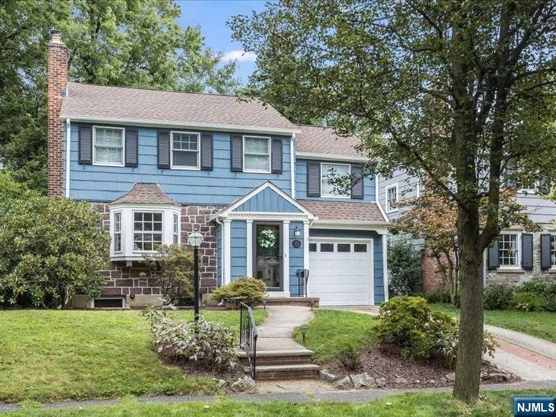 Opportunity knocks! This 3 bedroom, 1.1 bath move-in ready Colonial on a quiet South End side street is meticulously maintained and features a living room with fireplace & lovely mantle surround & large bay window, formal dining room, cheery sunporch open to the backyard and a kitchen with white cabinetry and stainless appliances. A powder room completes the first floor. Upstairs are 3 generously sized bedrooms with ample closet space and a large updated full bath. Fresh neutral paint colors throughout. The basement is pristine with laundry and storage and offers possibility for additional living space. Beautiful hardwood floors, CAC, 1 car attached garage with inside entrance. New roof 2022. Terrific backyard with patio for entertaining. Carteret Park is around the corner. Top-rated Glen Ridge school system. Jitney to train on Ridgewood Ave for direct NY train.