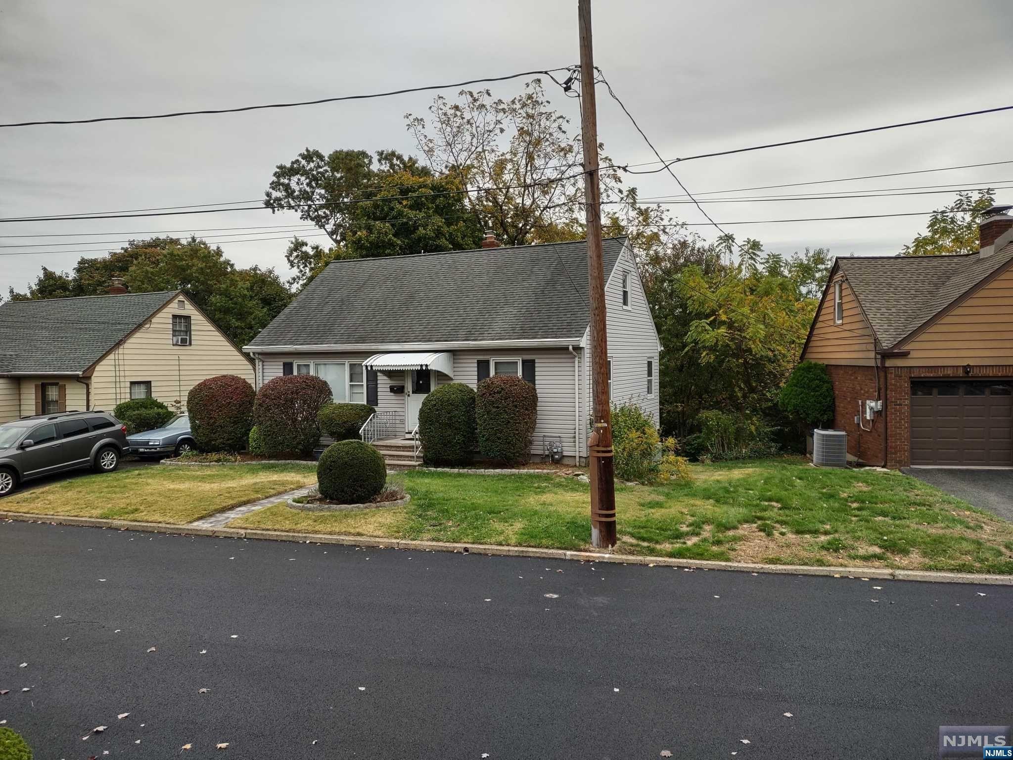 Sold strictly as is. Value is in the land, oversized 60x142 lot with seasonal NYC views (can be year round views if you top off some trees). Foundation needs significant repairs/replacement. Older tiles in basement have probable small amount of asbestos. Updates to electrical system needed.