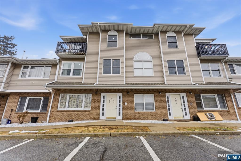 Completely renovated and move-in ready, this stunning 1-bedroom condo features an open-concept layout with custom finishes and high-end upgrades throughout. The bright living room includes decorative wall paneling, a built-in electric fireplace, and a custom TV wall frame. The modern kitchen is equipped with sleek cabinetry, stainless steel appliances, and quartz countertops. The spacious bedroom offers decorative wall accents and ample custom closet space. The fully updated bathroom boasts a rain shower system, modern vanity, and built-in Wi-Fi. Additional highlights include in-unit washer and dryer, recessed lighting, crown molding, a smart thermostat, new central air and heating system, new hot water heater, updated electrical, and new flooring throughout. Brand new windows installed in. June of 2025 with transferable warrenty. This turnkey home offers comfort, style, and convenience in every detail.This Unit comes with 1 Parking Spot!!!!