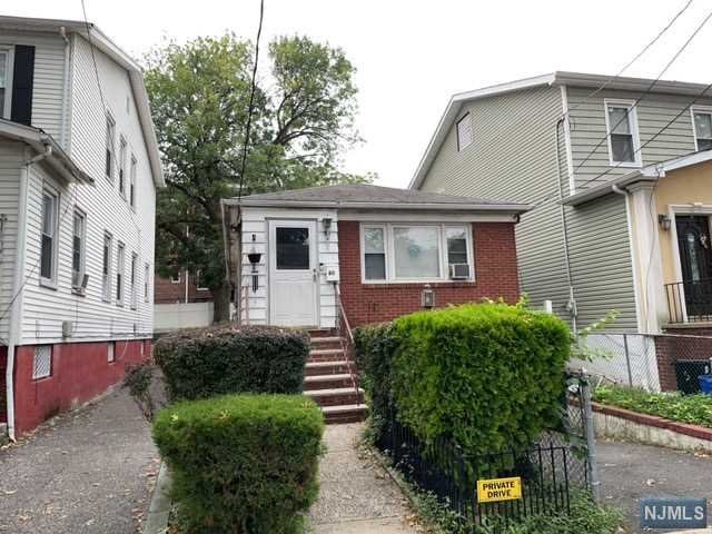 Cozy and quint ranch style property in Irvington. The property is currently occupied. Please do not disturb occupants. Interior access is not available at this time. The property is in close proximity to town attractions, public transportation and highways. Union Ave Middle School and Garden State Chancellor Park are a stone's throw away. Brick face with a 1 car attached garage a plus!...